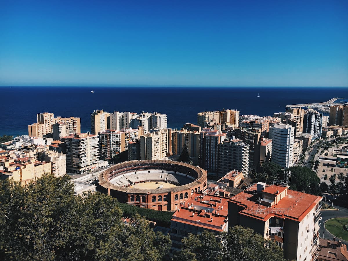 michael-martinelli-X414jjX3UHg-unsplash-2 View of houses and the arena in Malaga