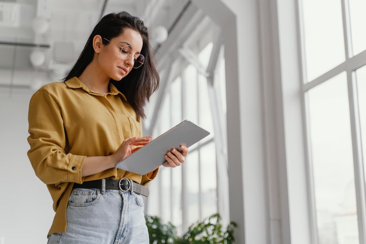 Real Estate Agent using a tablet