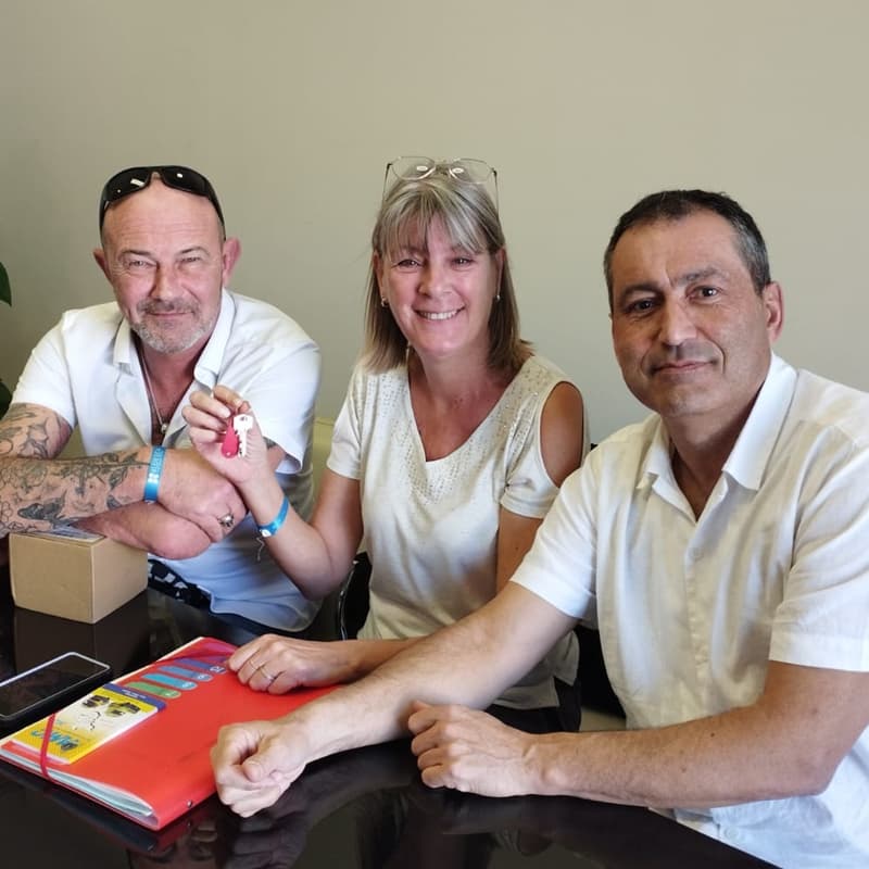 Property hunter with his clients at the notary's office