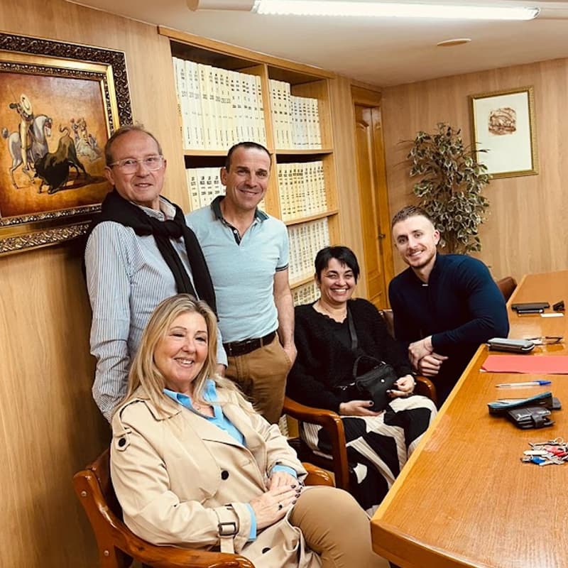Property hunter with his clients at the notary's office