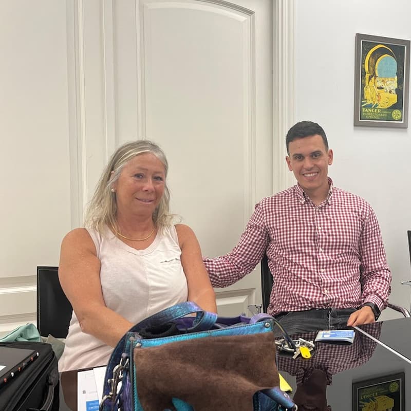 Property hunter with his client at the notary's office