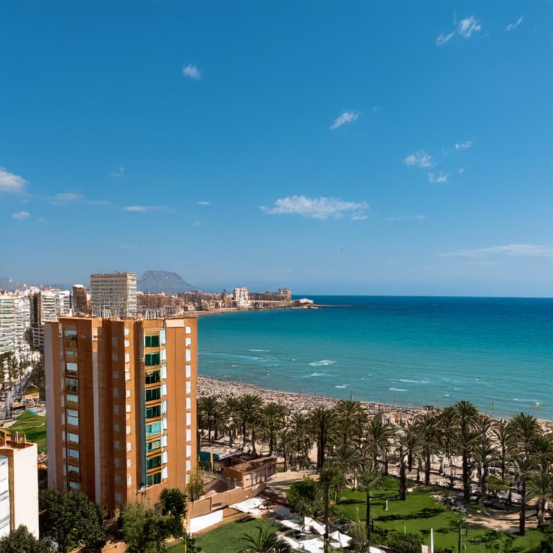 Scenic Spanish shoreline with crystal-clear sea and oceanfront buildings