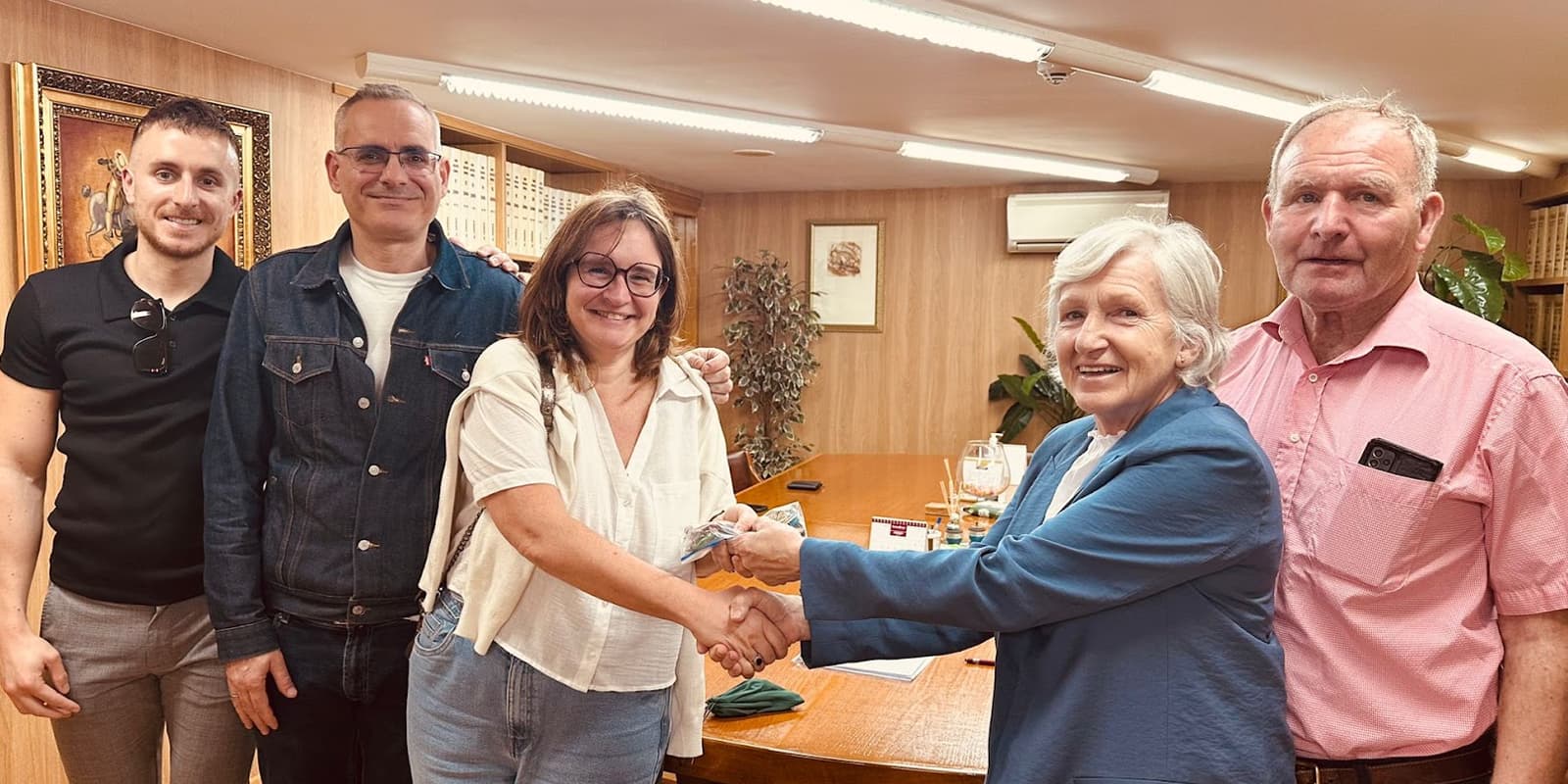 Property hunter with his clients at the notary's office