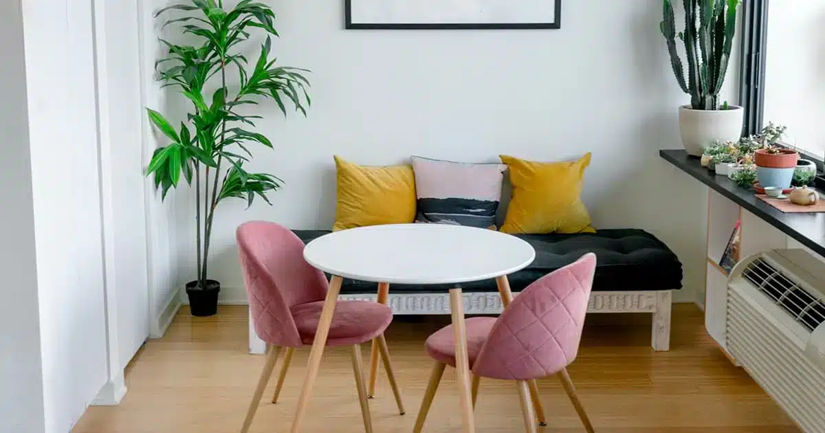 modern-apartment-interior-spain-2025 Bright modern living room of an apartment in Spain with colorful decor, representing Spanish real estate in 2025